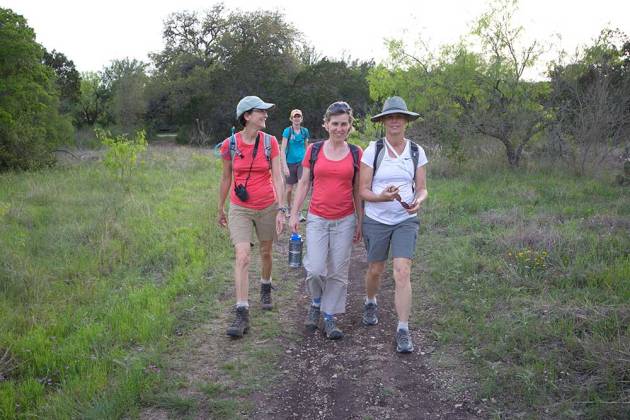 Suzanne, Maria, Bettina and Kelly hiking along the Far Reaches Trail. 